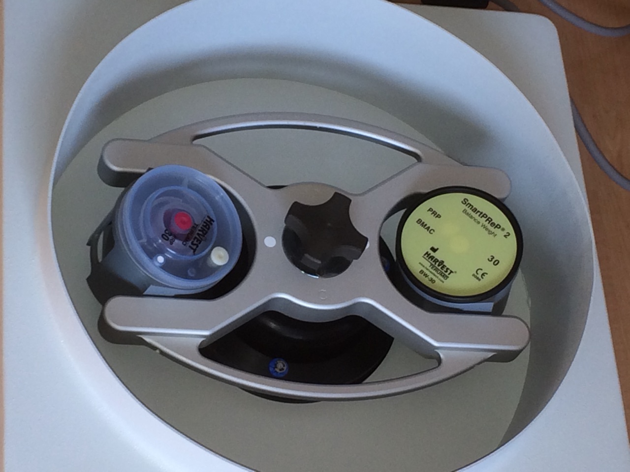 Blood tube spinning in a centrifuge prior to two-stage centrifugation